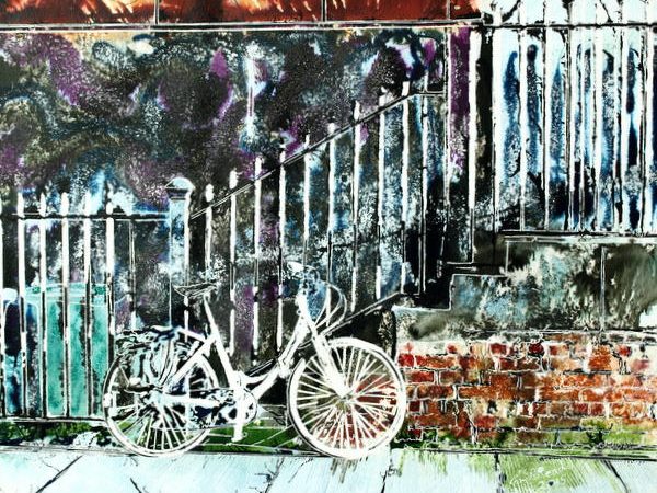 Urban art inspiration in a painting of a White bicycle glowing in the sunlight propped up against railings in Manchester. White Bicycle- ©2015 - Cathy Read -Watercolour and Acrylic - 40 x 50 cm