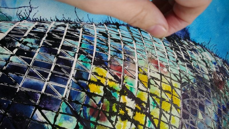 Close up of masking fluid being removed from Harlequin Gherkin painting by Cathy Read