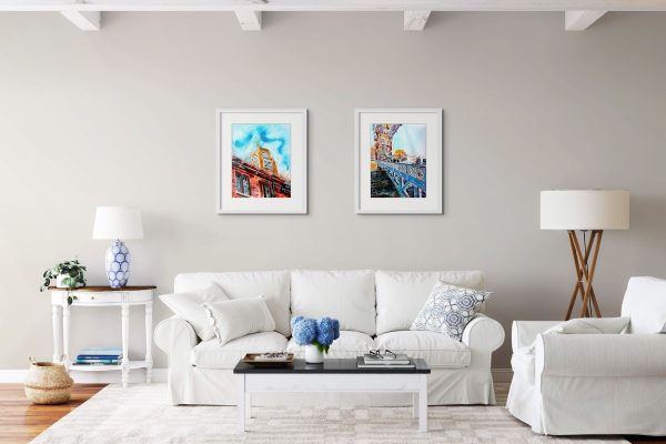 Room setting featuring Oxo Tower and Crossing Tower Bridge, original paintings by artist Cathy Read. Featuring an images of Tower Bridge and the Oxo Tower on the Thames in London